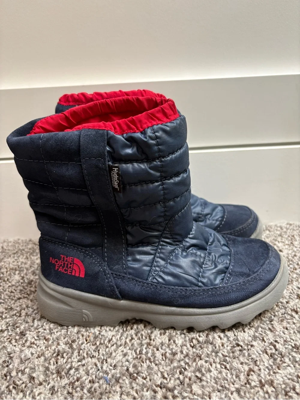 The North Face Navy with Red Lined Quilted Winter Boots